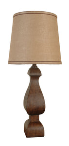 Table Lamp Features A Polyresin Base In Brown Wood Look