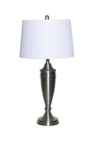 Table Lamp Features A Polyresin Base With Linen Shade